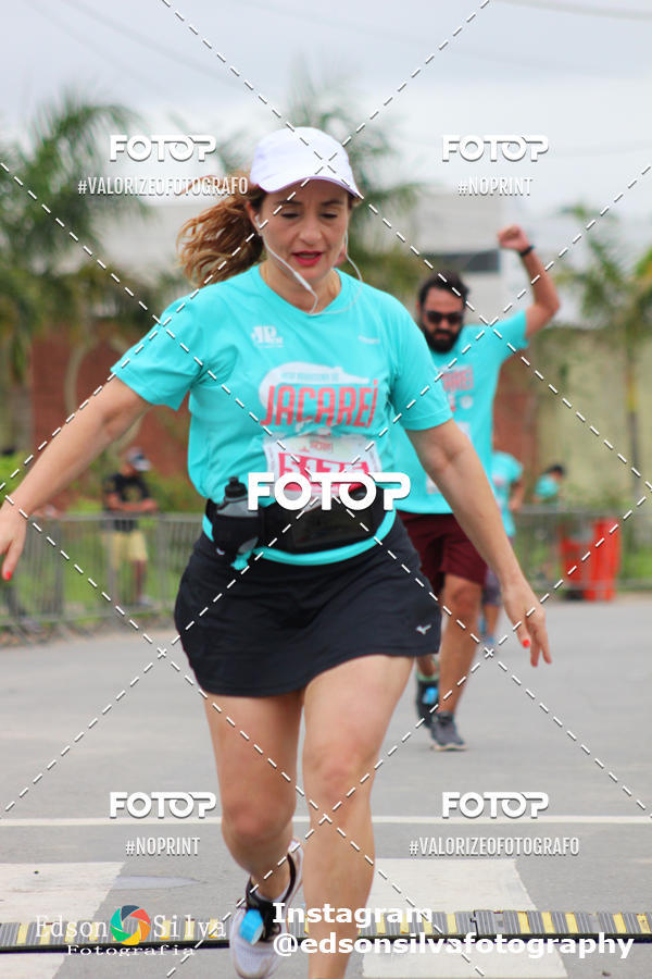 Buy your photos of the eventMEIA MARATONA DE JACARE  on Fotop