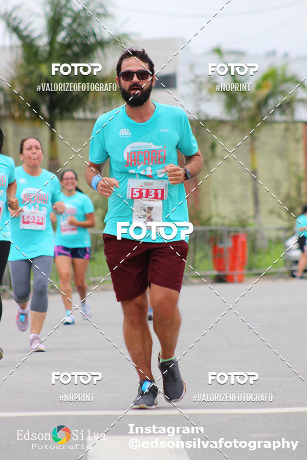 Buy your photos of the eventMEIA MARATONA DE JACARE  on Fotop