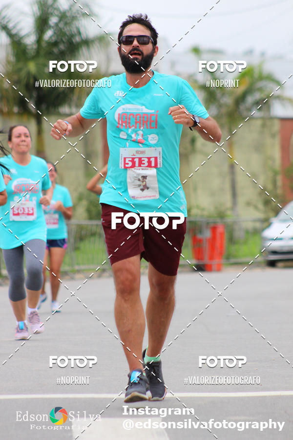Buy your photos of the eventMEIA MARATONA DE JACARE  on Fotop
