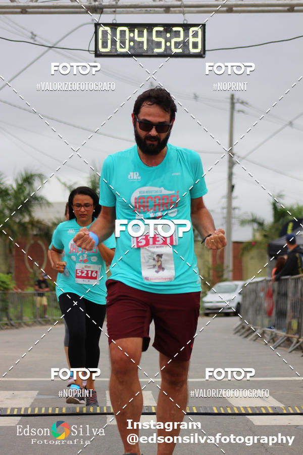 Buy your photos of the eventMEIA MARATONA DE JACARE  on Fotop