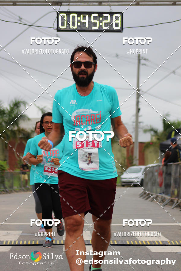 Buy your photos of the eventMEIA MARATONA DE JACARE  on Fotop
