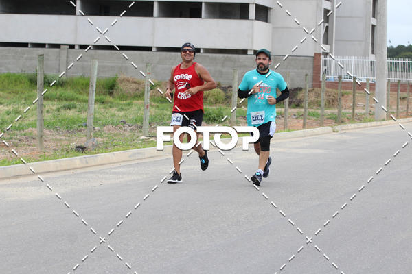 Buy your photos of the eventMEIA MARATONA DE JACARE  on Fotop