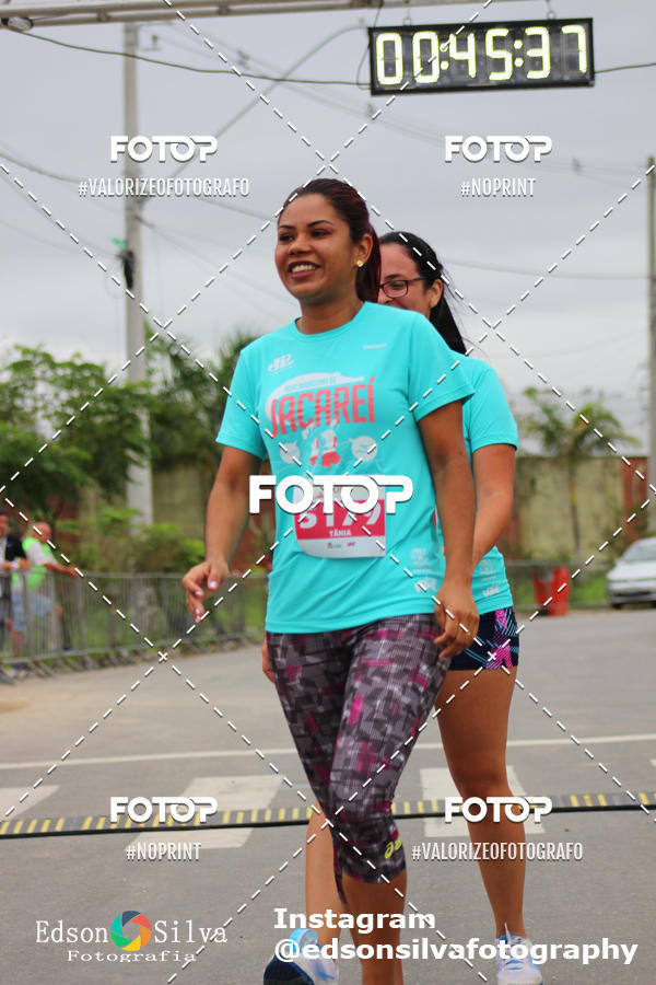 Buy your photos of the eventMEIA MARATONA DE JACARE  on Fotop