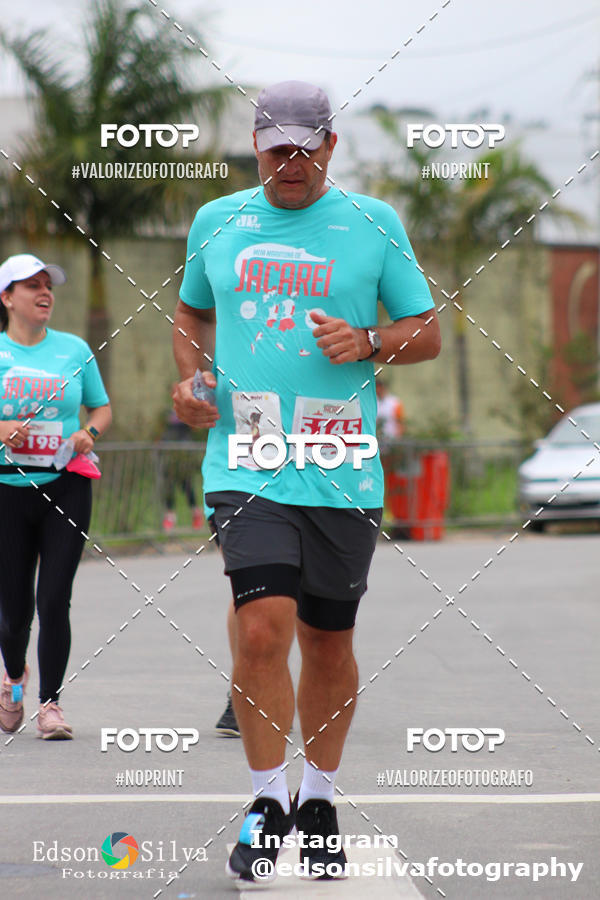 Buy your photos of the eventMEIA MARATONA DE JACARE  on Fotop