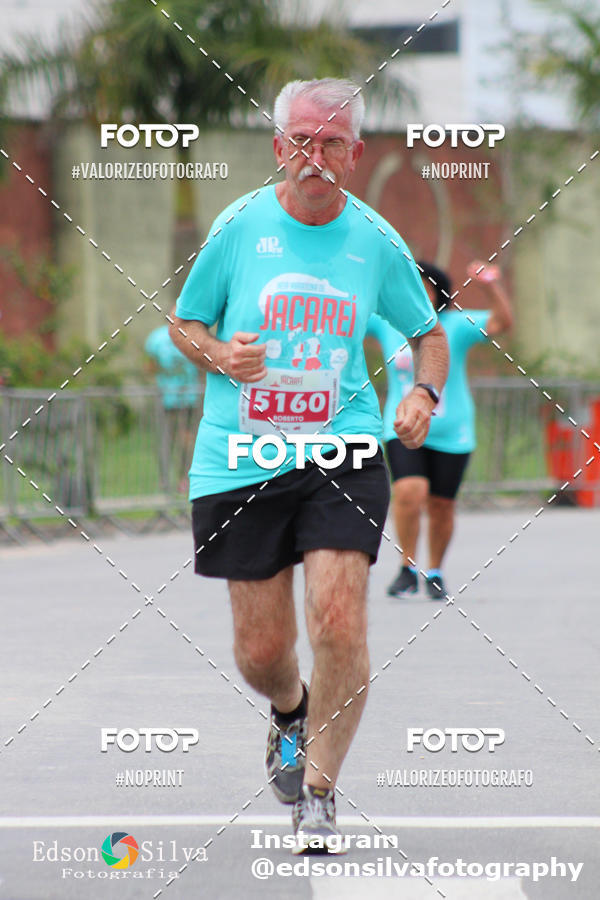 Buy your photos of the eventMEIA MARATONA DE JACARE  on Fotop
