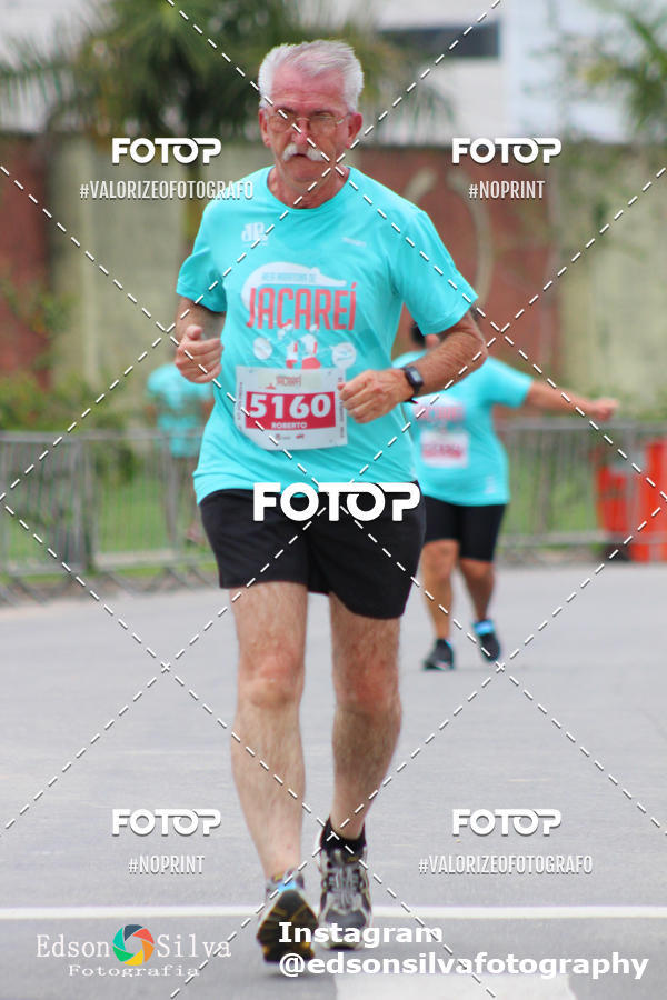 Buy your photos of the eventMEIA MARATONA DE JACARE  on Fotop