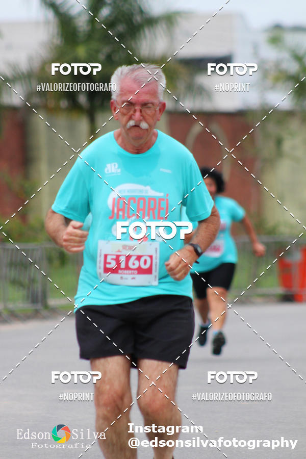 Buy your photos of the eventMEIA MARATONA DE JACARE  on Fotop