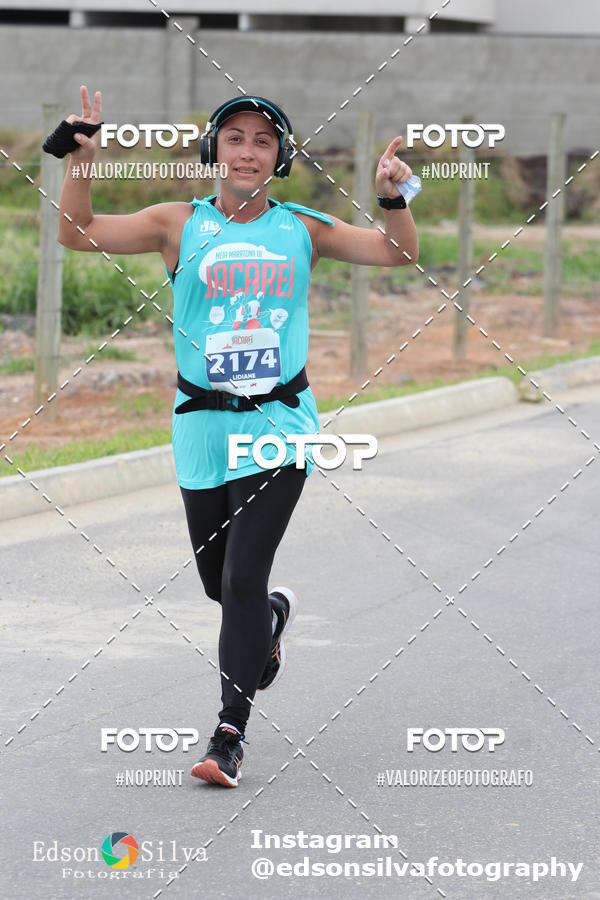 Buy your photos of the eventMEIA MARATONA DE JACARE  on Fotop