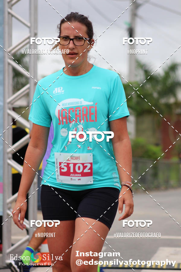 Buy your photos of the eventMEIA MARATONA DE JACARE  on Fotop