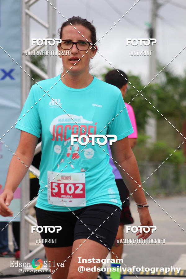 Buy your photos of the eventMEIA MARATONA DE JACARE  on Fotop