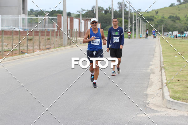 Buy your photos of the eventMEIA MARATONA DE JACARE  on Fotop