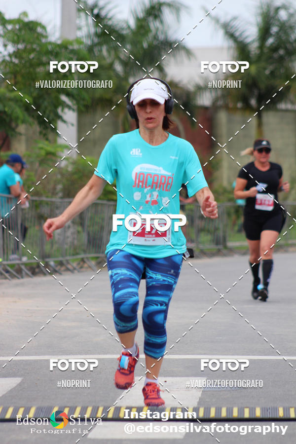 Buy your photos of the eventMEIA MARATONA DE JACARE  on Fotop
