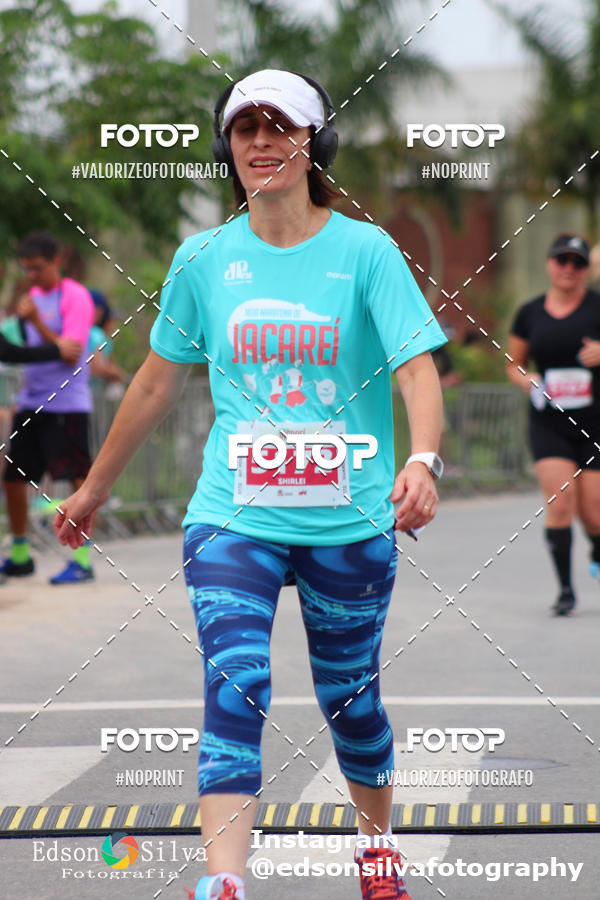 Buy your photos of the eventMEIA MARATONA DE JACARE  on Fotop