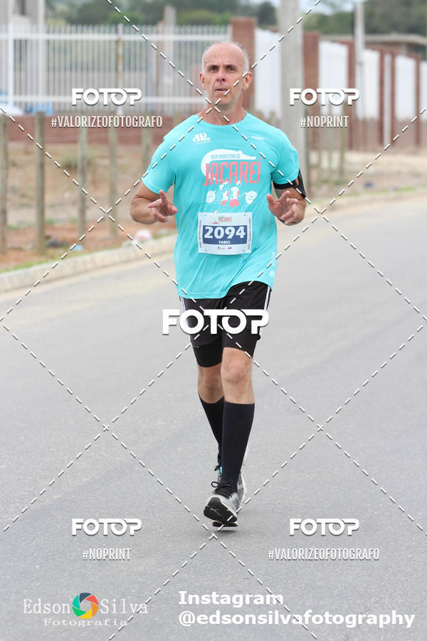 Buy your photos of the eventMEIA MARATONA DE JACARE  on Fotop