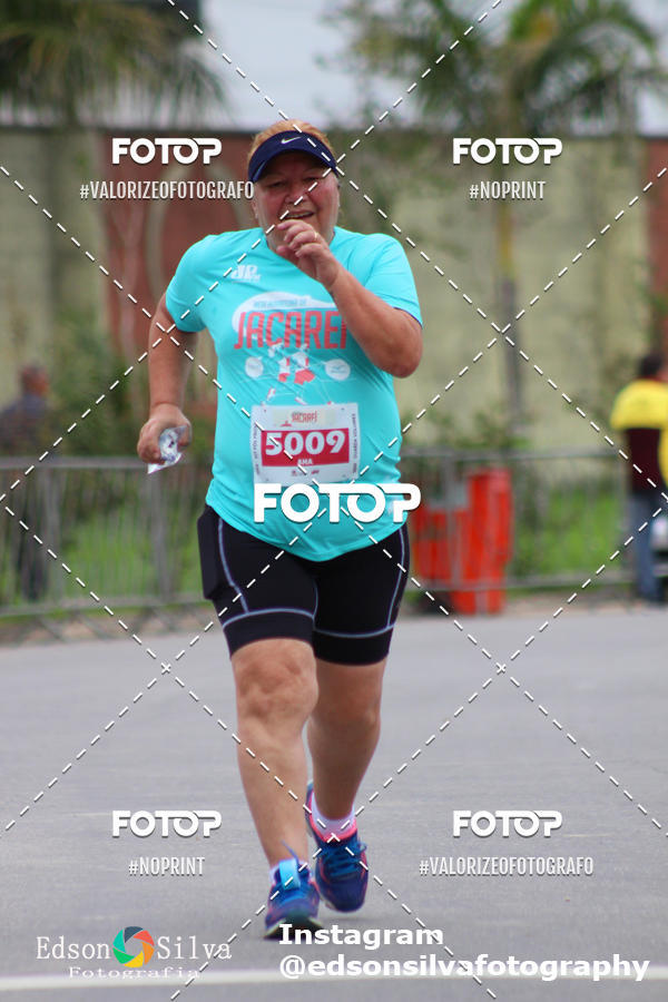 Buy your photos of the eventMEIA MARATONA DE JACARE  on Fotop
