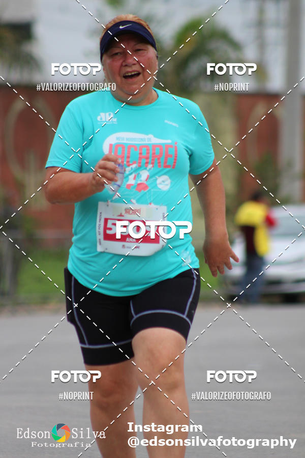 Buy your photos of the eventMEIA MARATONA DE JACARE  on Fotop
