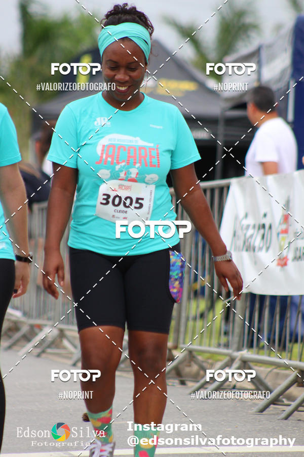Buy your photos of the eventMEIA MARATONA DE JACARE  on Fotop