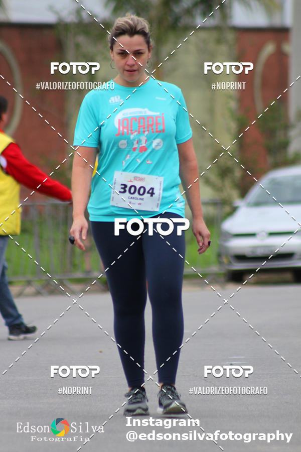 Buy your photos of the eventMEIA MARATONA DE JACARE  on Fotop