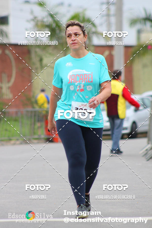Buy your photos of the eventMEIA MARATONA DE JACARE  on Fotop
