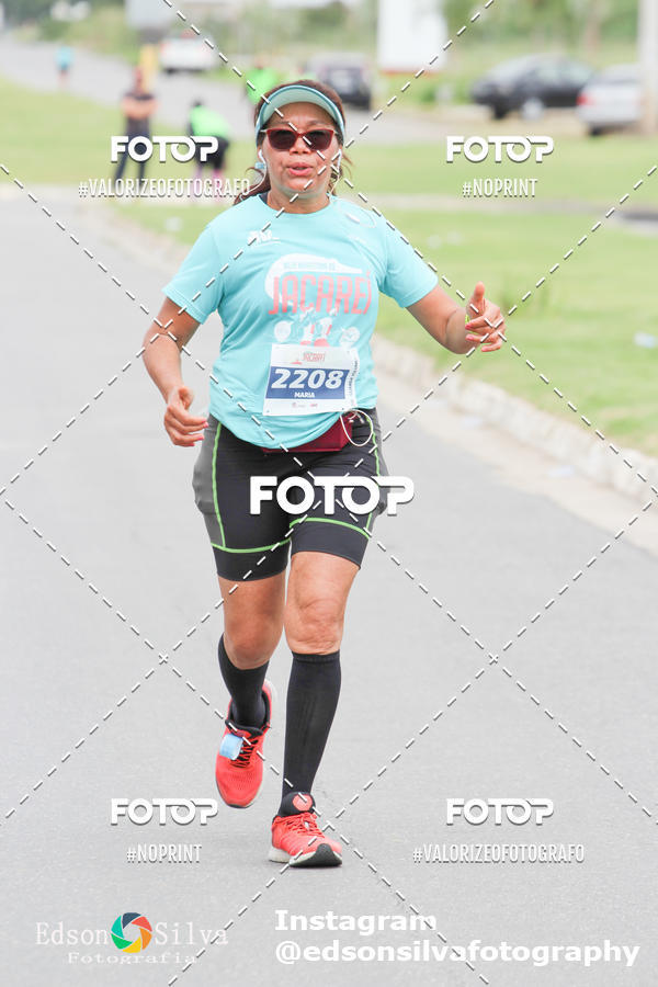 Buy your photos of the eventMEIA MARATONA DE JACARE  on Fotop