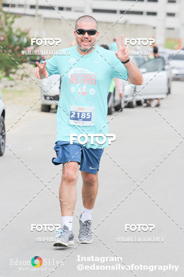 Buy your photos of the eventMEIA MARATONA DE JACARE  on Fotop