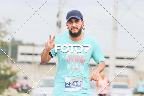 Buy your photos of the eventMEIA MARATONA DE JACARE  on Fotop