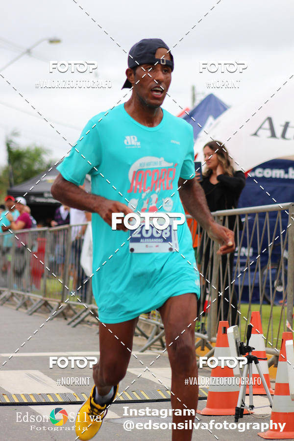 Buy your photos of the eventMEIA MARATONA DE JACARE  on Fotop