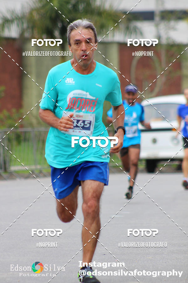 Buy your photos of the eventMEIA MARATONA DE JACARE  on Fotop