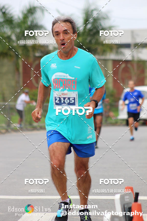 Buy your photos of the eventMEIA MARATONA DE JACARE  on Fotop
