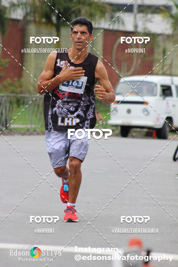 Buy your photos of the eventMEIA MARATONA DE JACARE  on Fotop