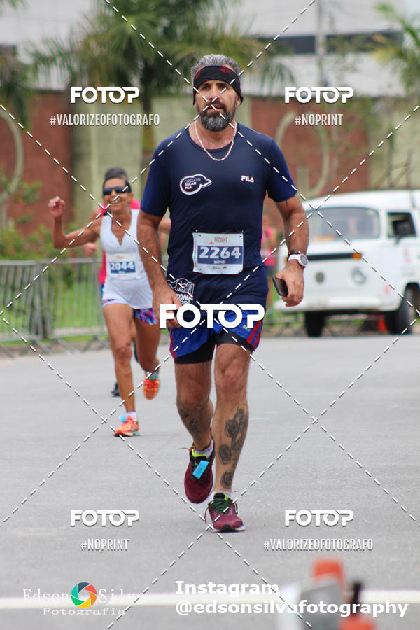 Buy your photos of the eventMEIA MARATONA DE JACARE  on Fotop