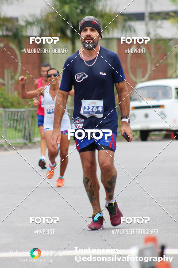 Buy your photos of the eventMEIA MARATONA DE JACARE  on Fotop