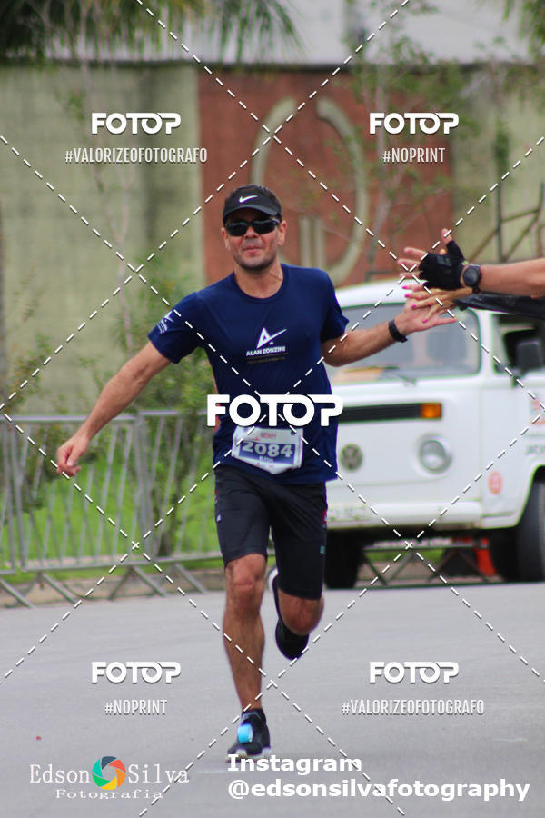 Buy your photos of the eventMEIA MARATONA DE JACARE  on Fotop