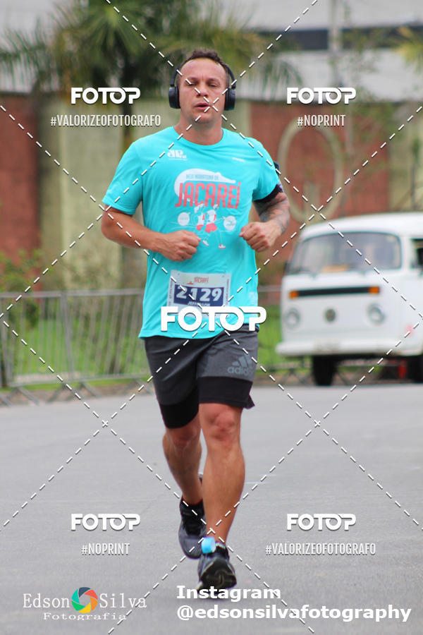 Buy your photos of the eventMEIA MARATONA DE JACARE  on Fotop