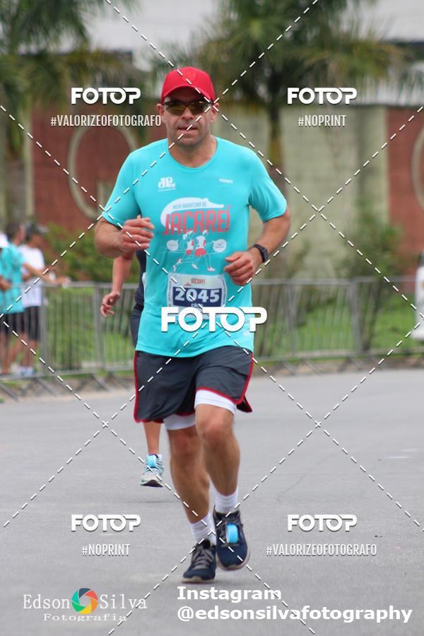 Buy your photos of the eventMEIA MARATONA DE JACARE  on Fotop