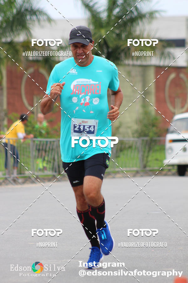Buy your photos of the eventMEIA MARATONA DE JACARE  on Fotop