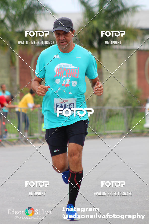 Buy your photos of the eventMEIA MARATONA DE JACARE  on Fotop