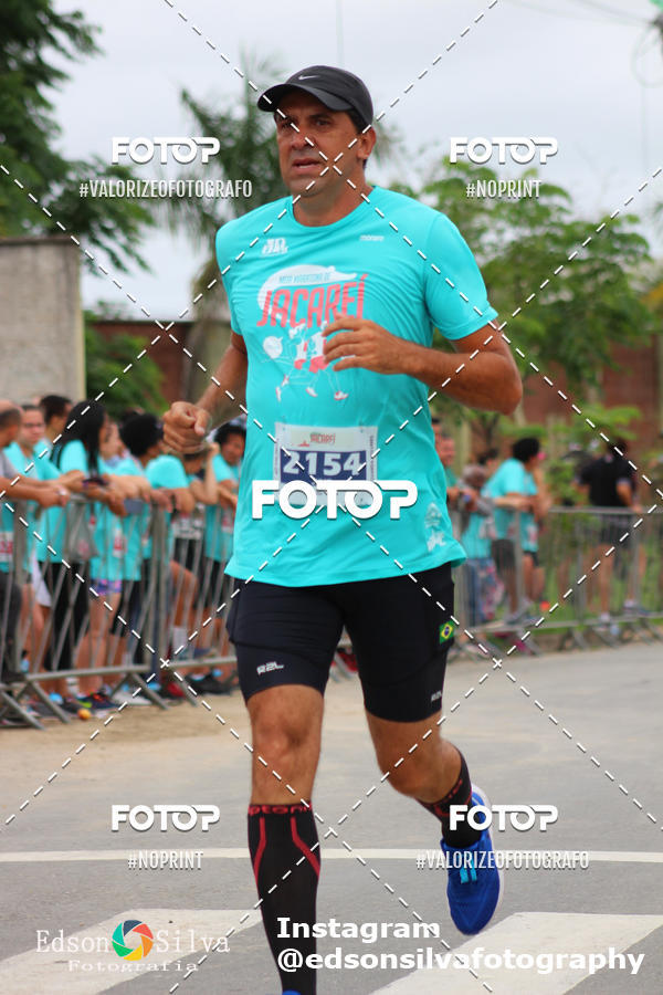 Buy your photos of the eventMEIA MARATONA DE JACARE  on Fotop