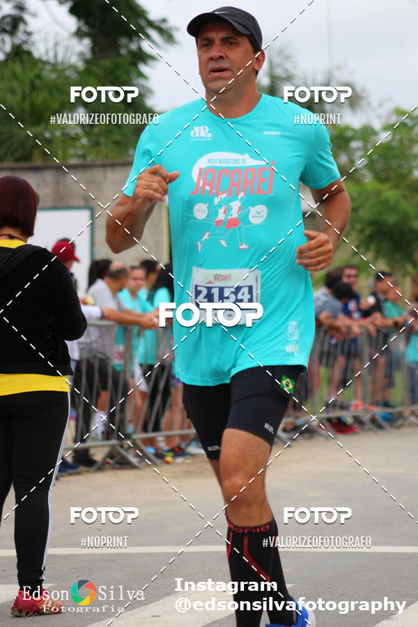 Buy your photos of the eventMEIA MARATONA DE JACARE  on Fotop