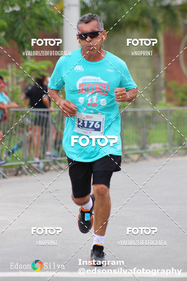 Buy your photos of the eventMEIA MARATONA DE JACARE  on Fotop