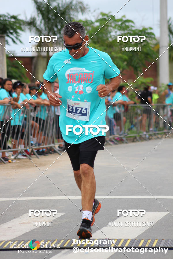 Buy your photos of the eventMEIA MARATONA DE JACARE  on Fotop