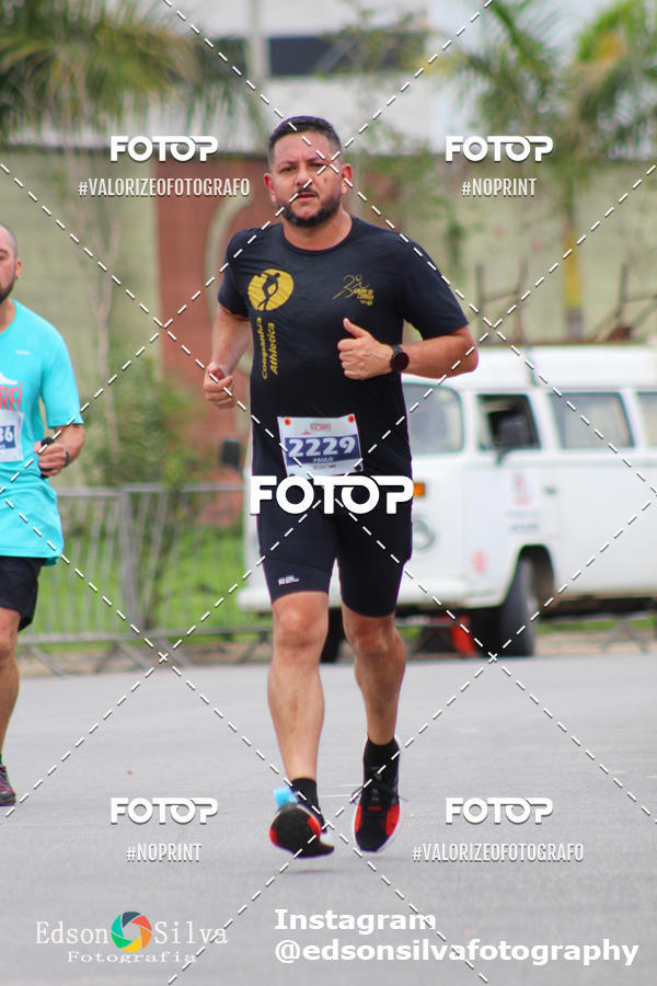 Buy your photos of the eventMEIA MARATONA DE JACARE  on Fotop