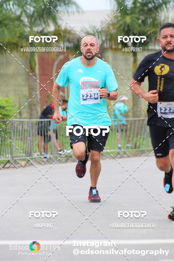 Buy your photos of the eventMEIA MARATONA DE JACARE  on Fotop
