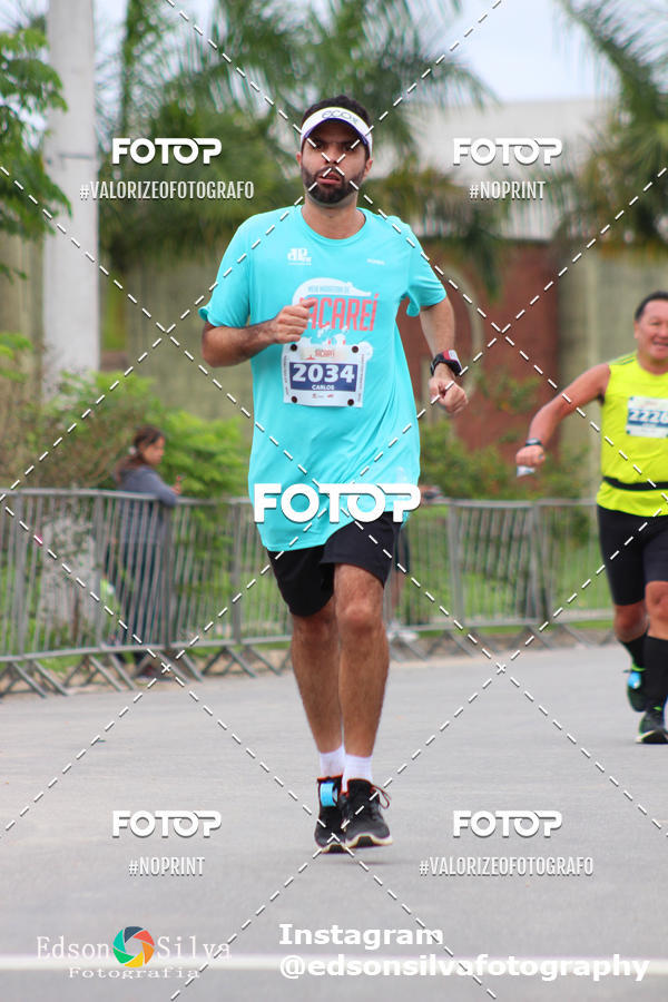 Buy your photos of the eventMEIA MARATONA DE JACARE  on Fotop