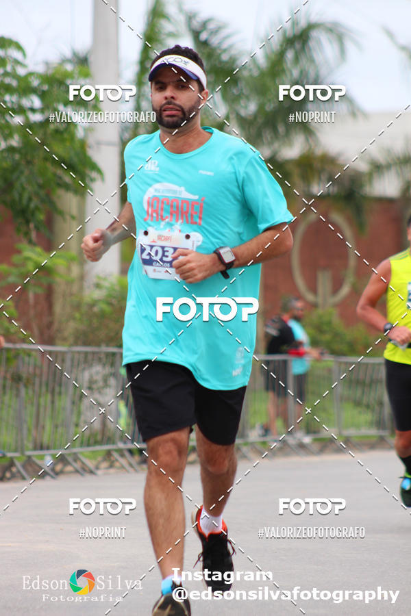Buy your photos of the eventMEIA MARATONA DE JACARE  on Fotop
