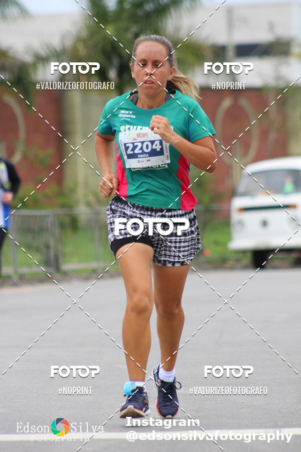 Buy your photos of the eventMEIA MARATONA DE JACARE  on Fotop