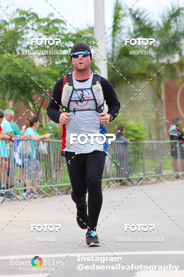 Buy your photos of the eventMEIA MARATONA DE JACARE  on Fotop