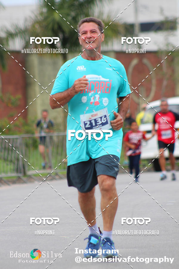 Buy your photos of the eventMEIA MARATONA DE JACARE  on Fotop
