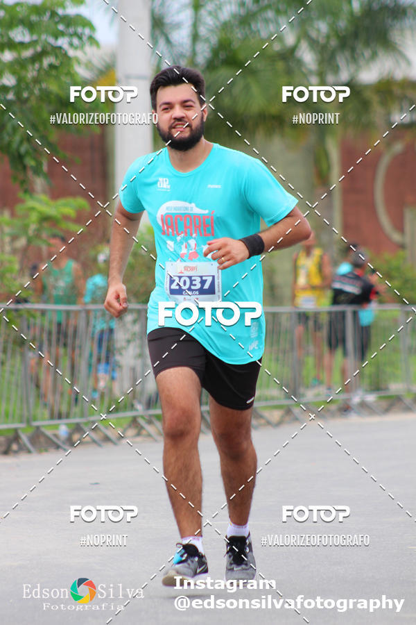 Buy your photos of the eventMEIA MARATONA DE JACARE  on Fotop