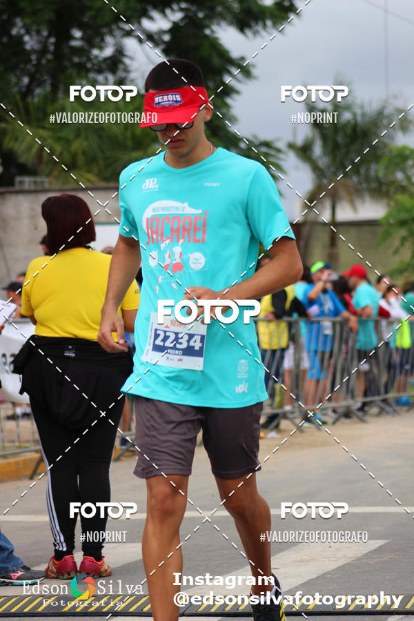 Buy your photos of the eventMEIA MARATONA DE JACARE  on Fotop